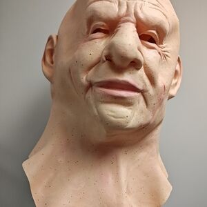 Realistic Latex Mask. Also unicorn mask and purple boa